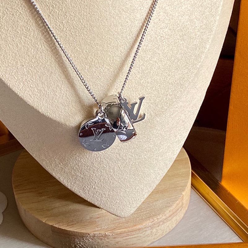 LV Silver Ring & Disc Necklace - Image 6