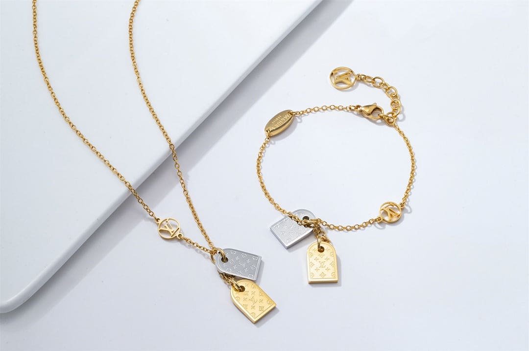LV Monogram Tag Gold And Silver Charm Bracelet - Image 8