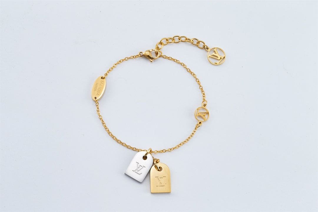 LV Monogram Tag Gold And Silver Charm Bracelet - Image 4