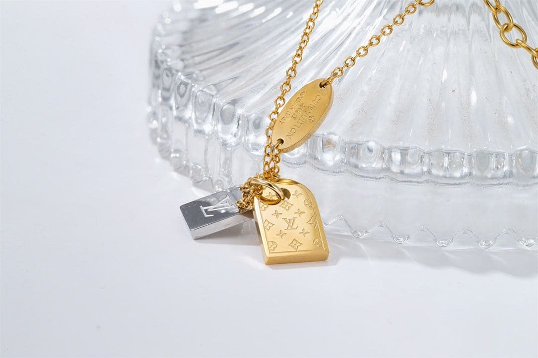 LV Monogram Tag Gold And Silver Charm Bracelet - Image 5