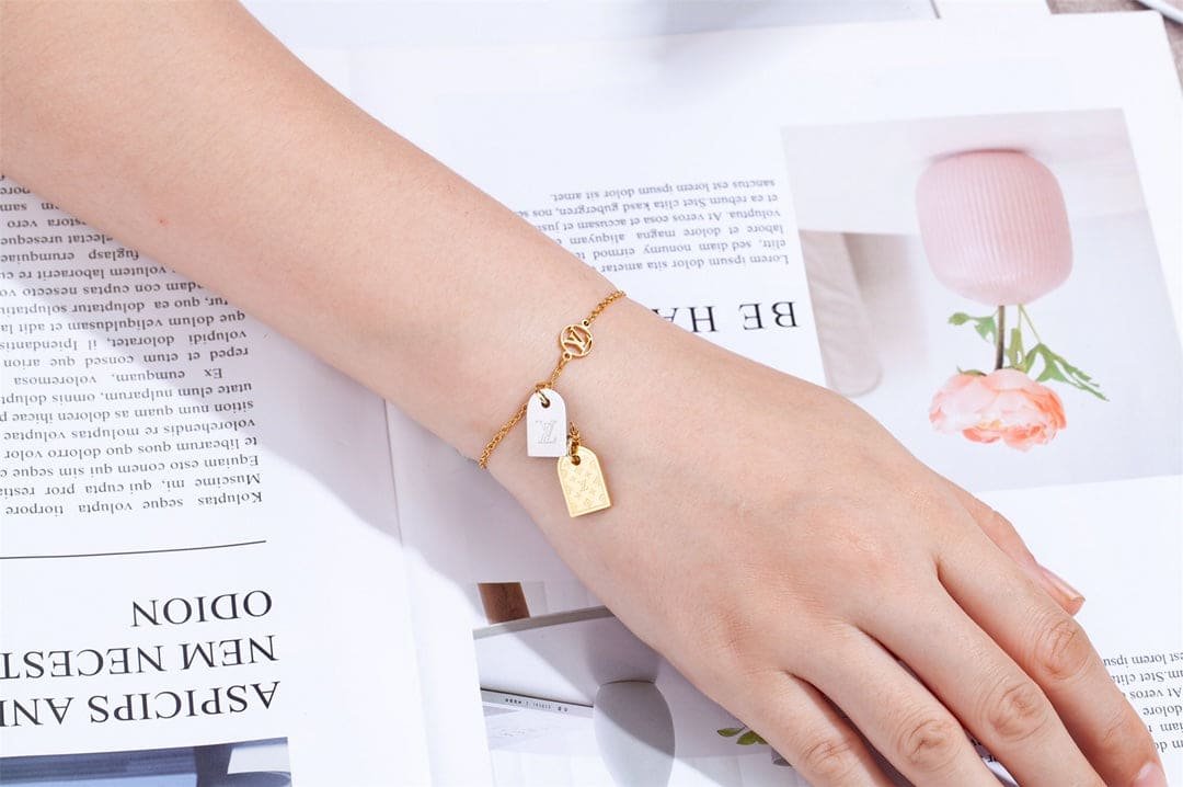 LV Monogram Tag Gold And Silver Charm Bracelet - Image 6