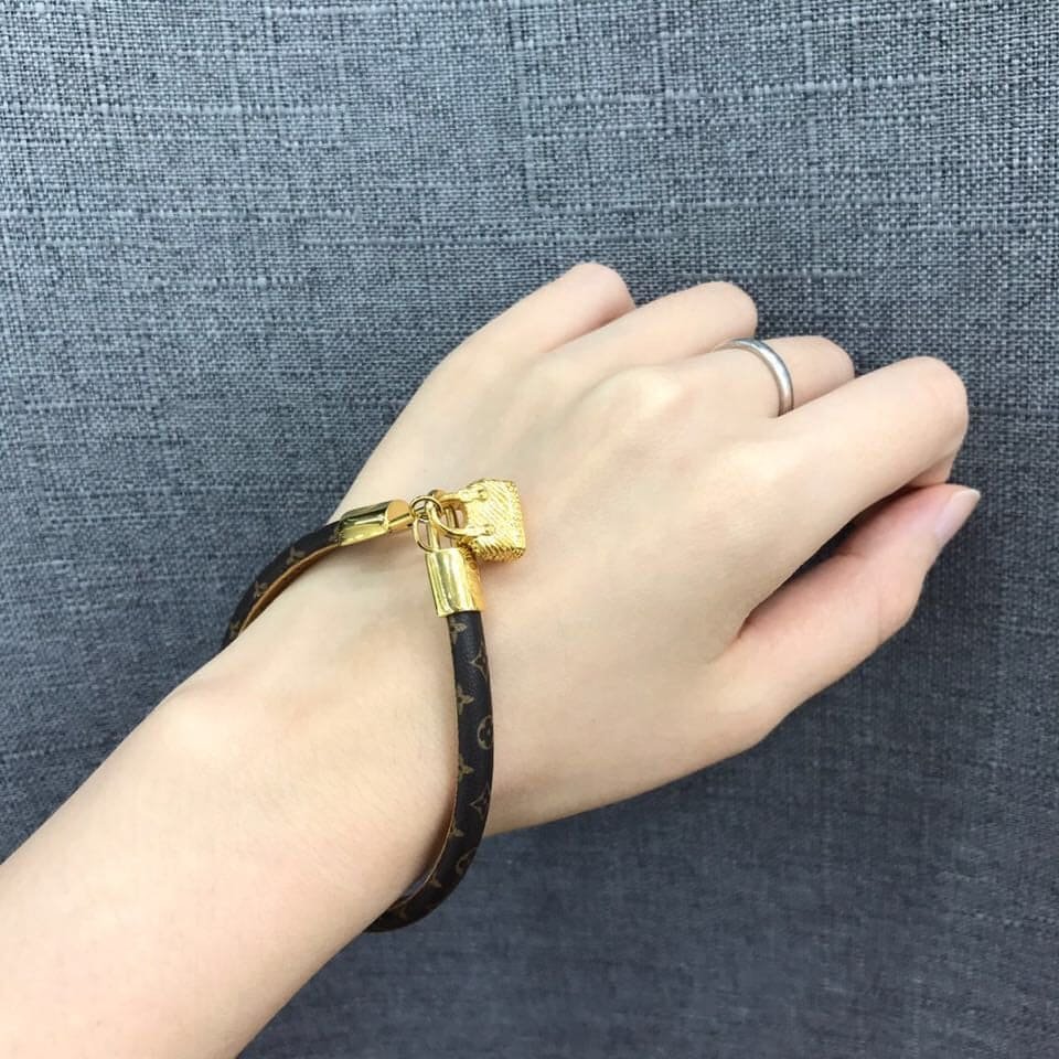 LV Gold-Tone Alma Bag Charm Bracelet - Image 4