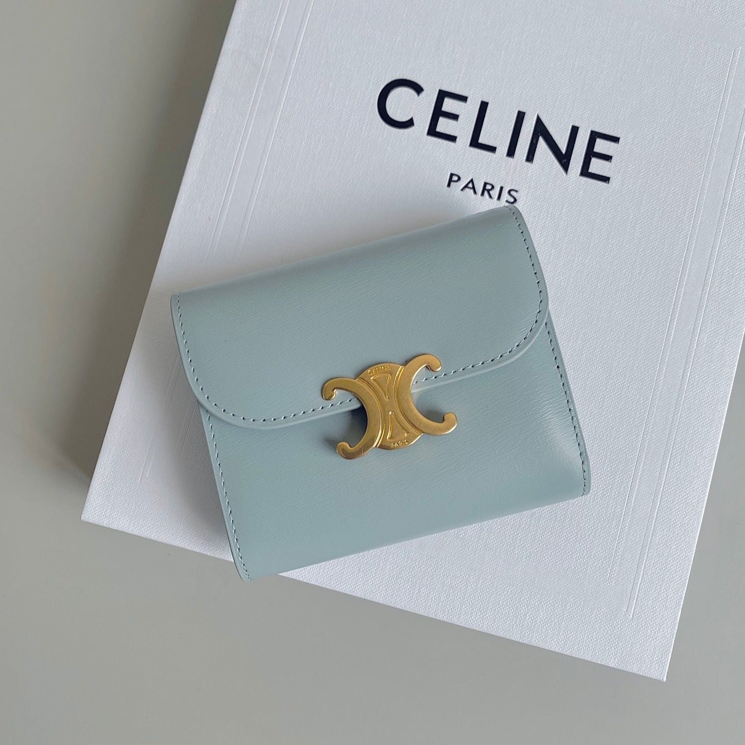 CELINE TRIPHOME 10 TRIFOLD WALLET CALFSKIN BLUE PASTEL