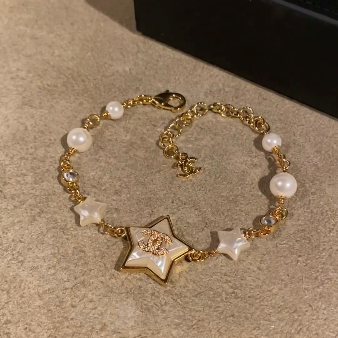 Chanel Gold Mother-of-Pearl Star CC Bracelet
