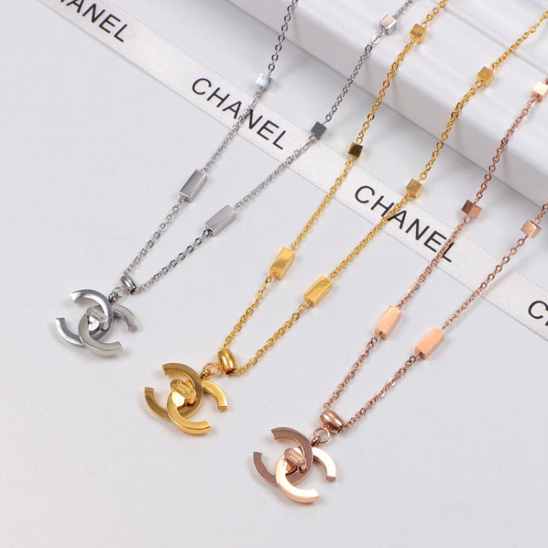 Chanel Three-Tone Metal Pendant Necklaces