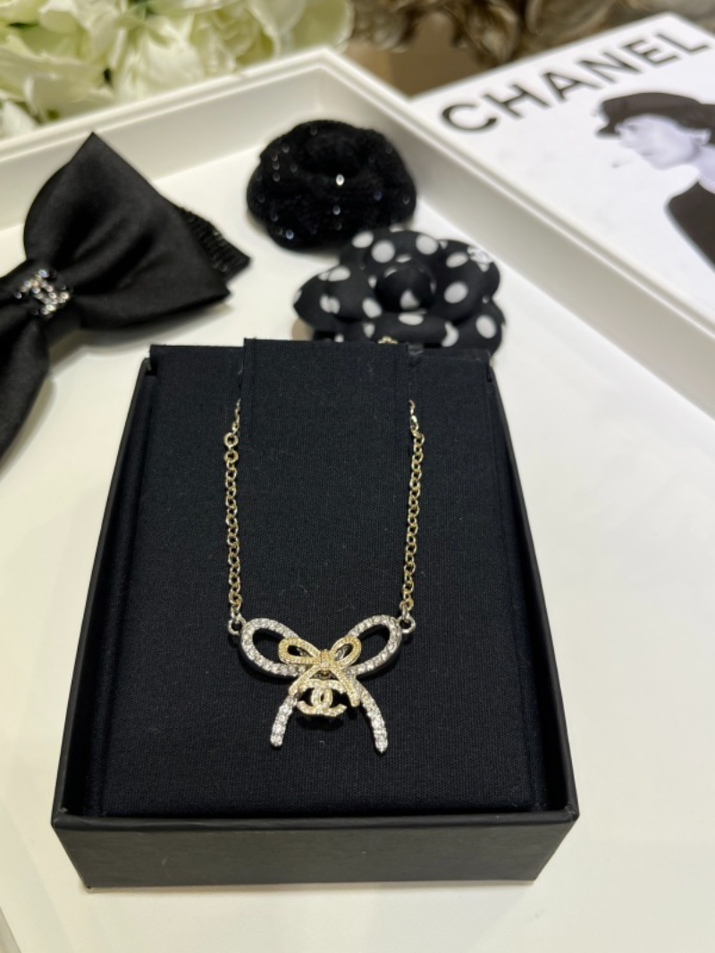 Chanel Two-Tone Crystal Bow Double C Necklace - Image 4