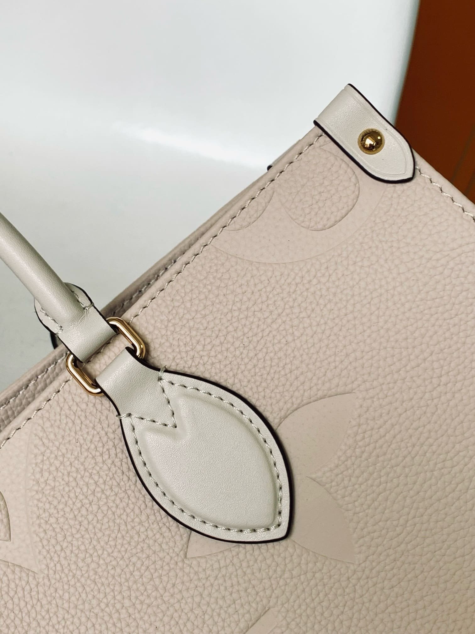 Louis Vuitton OnTheGo MM Embossed - Image 11