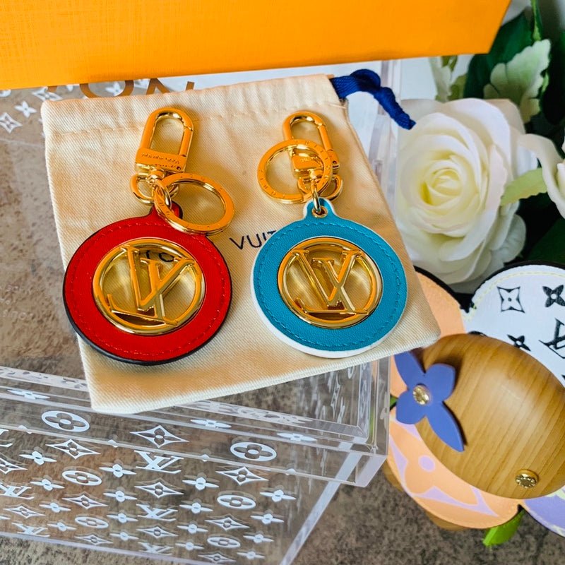 LV Round With Gold-Tone Logo Keychain