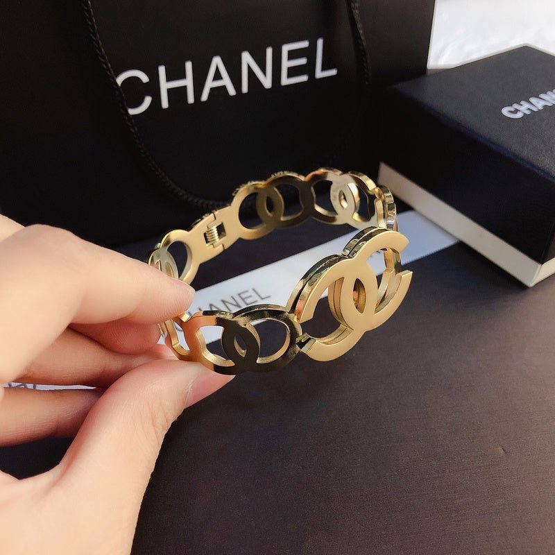 CHANEL Large Hollow Double CC Gold Cuff Bracelet - Image 4