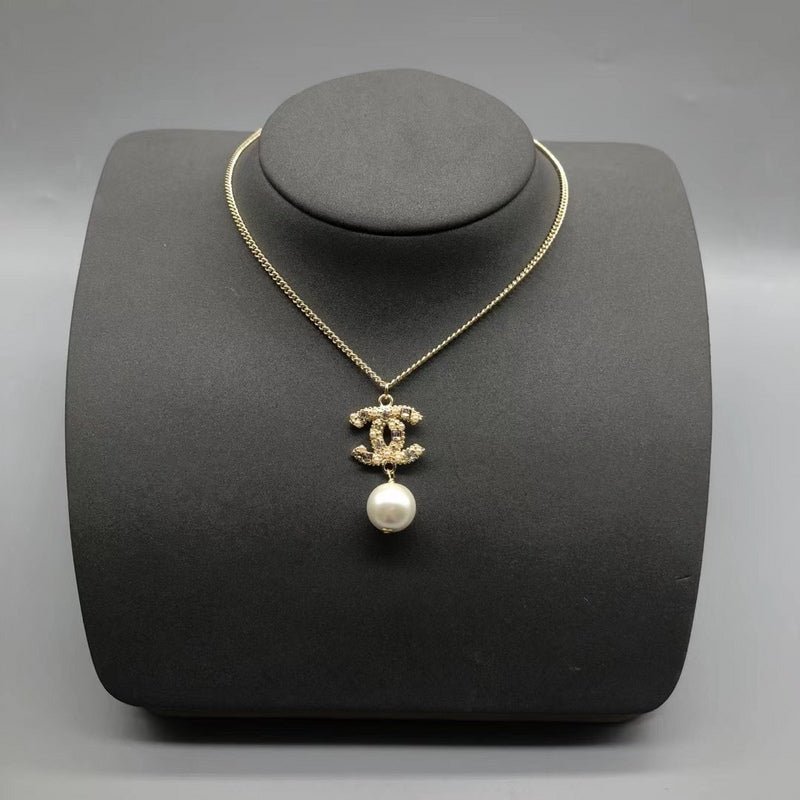 Chanel Snake Chain Pearl Double C Necklace