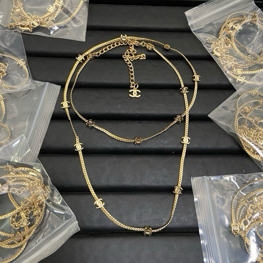 Chanel Gold Snake Bone CC Long Necklace