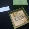 GUCCI Engraved GG Pattern Gold Cuff Bangle
