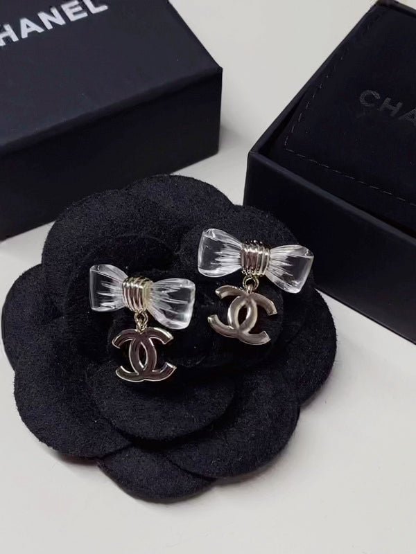 Chanel Resin Bow Silver Logo Earrings - Image 6