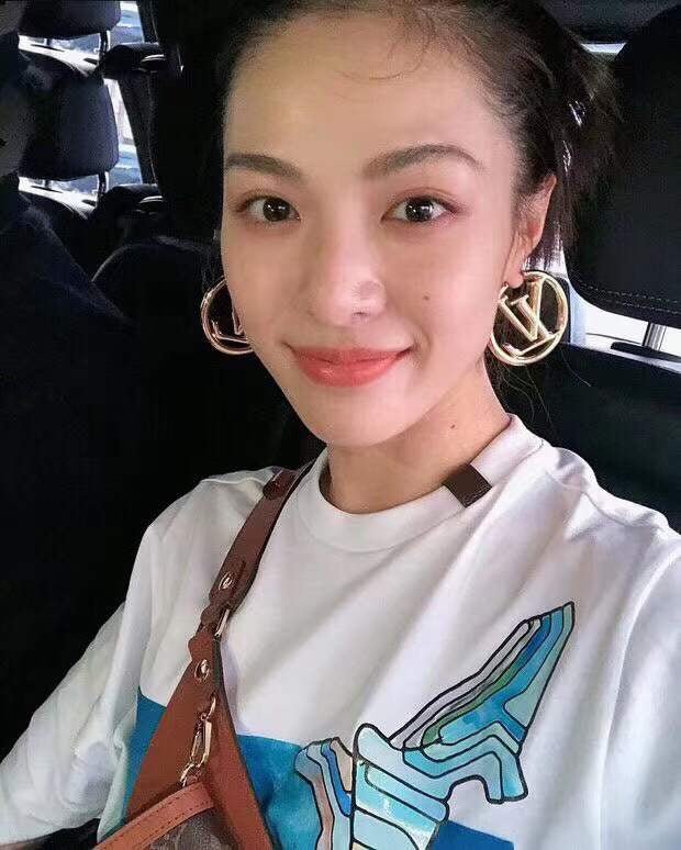 LV Open Logo Hoop Sophisticated Earrings - Image 4