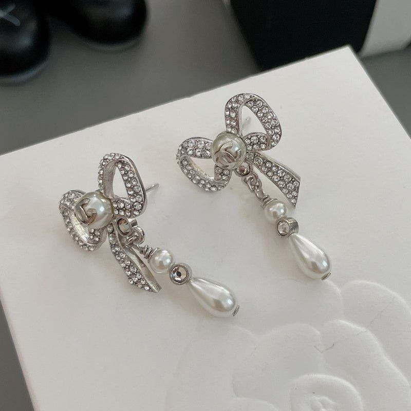 CHANEL Silver Rhinestone Bow Teardrop Pearl Earrings - Image 4