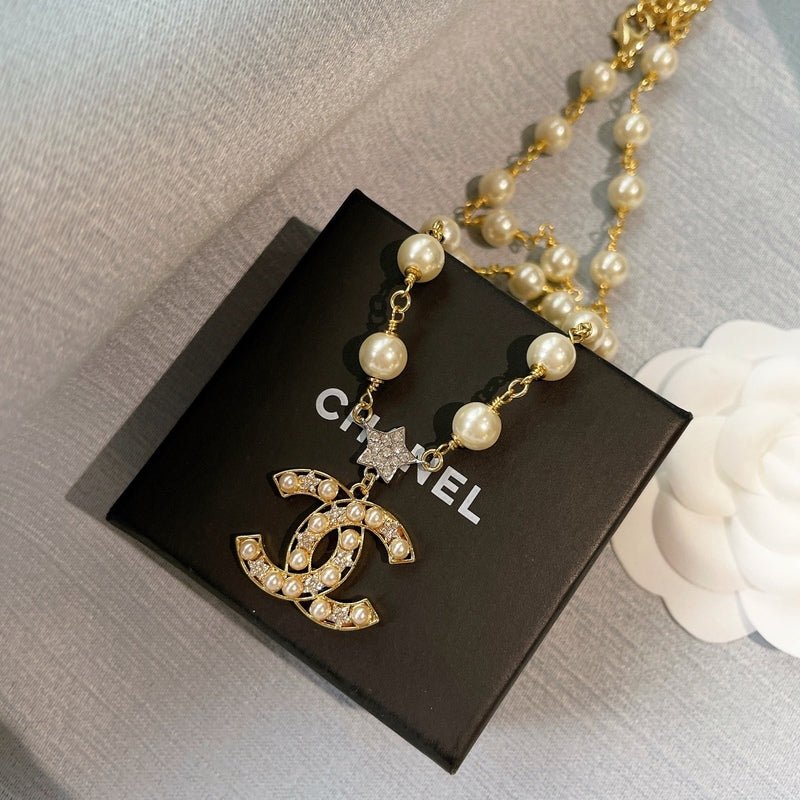 Chanel Gold Pearl Star CC Logo Necklace - Image 3
