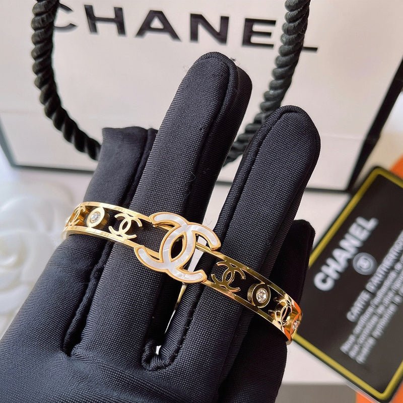 CHANEL Hollow Enamel Crystal CC Cutout Bangle