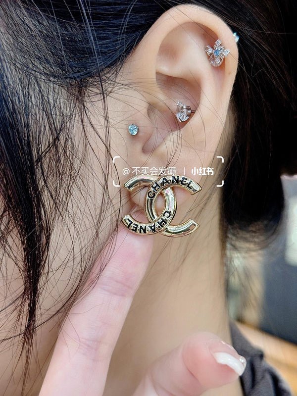 CHANEL Engraved Gold Double C Stud Earrings - Image 7