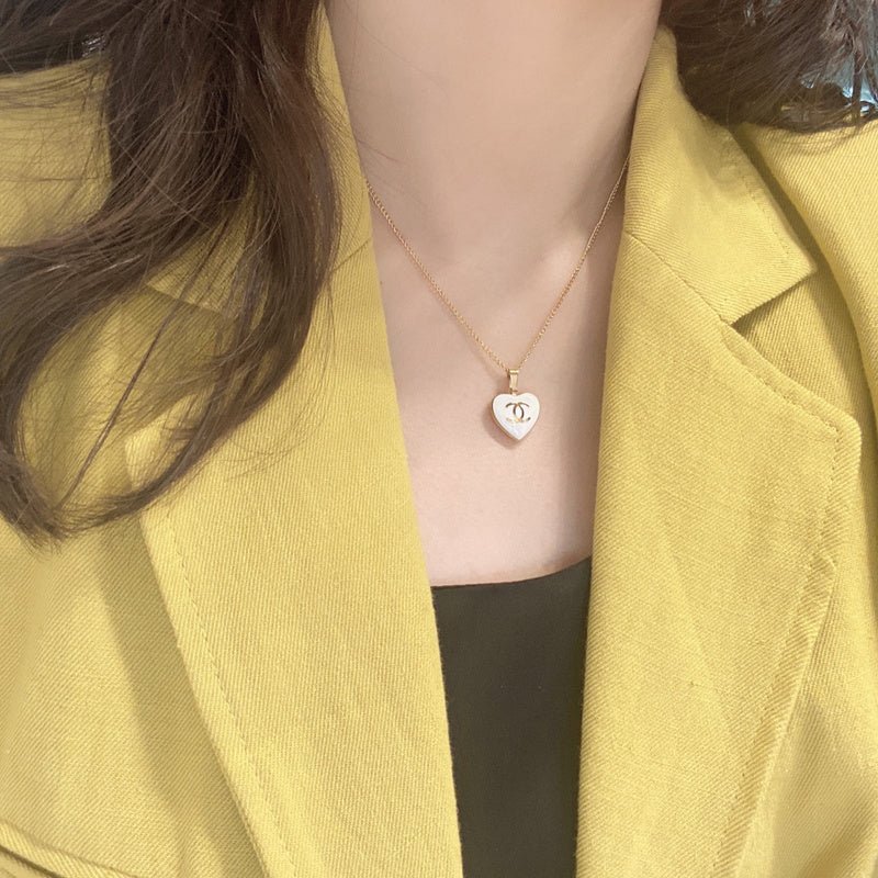 Alternative view of Chanel Gold Enamel Heart CC Pendant Necklaces
