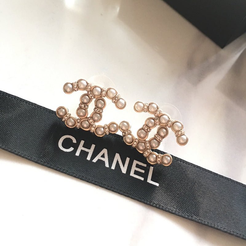 Chanel Pearl Inlaid Double C Stud Earrings