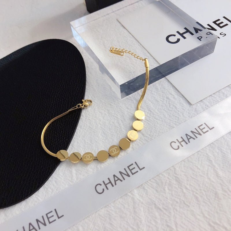 Chanel Round Disc Snake Bone Metal Bracelet