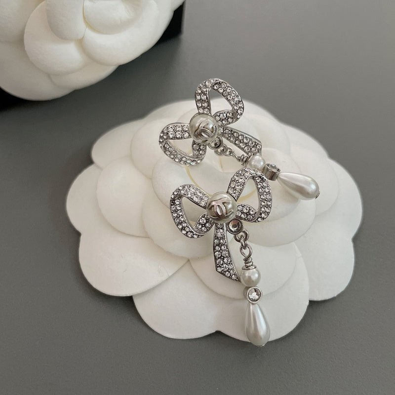 CHANEL Silver Rhinestone Bow Teardrop Pearl Earrings - Image 6