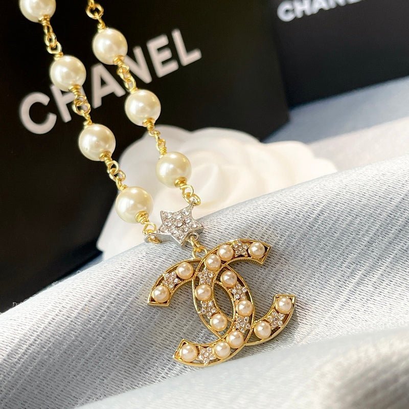 Chanel Gold Pearl Star CC Logo Necklace - Image 8