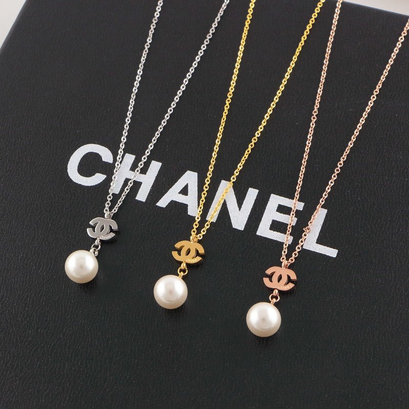 Chanel Three-Tone Metal Pearl CC Pendant Necklaces