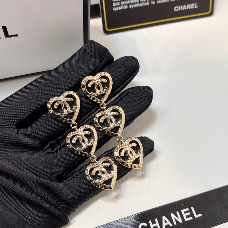CHANEL Hollow Crystal Layered Heart CC Drop Earrings