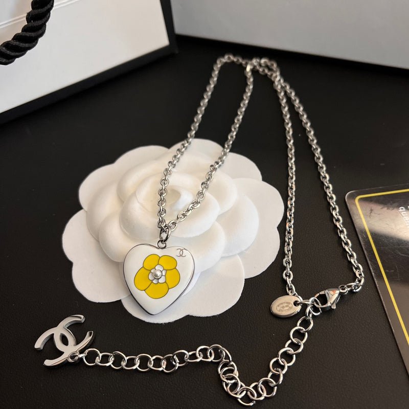 Chanel Silver Heart Yellow Flower Enamel CC Necklace
