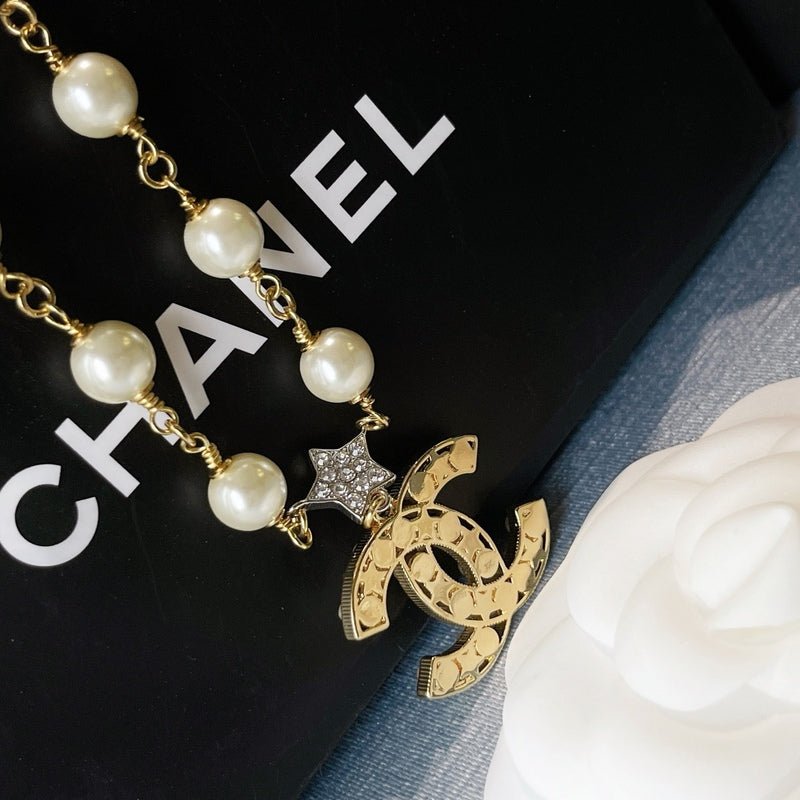 Chanel Gold Pearl Star CC Logo Necklace - Image 4