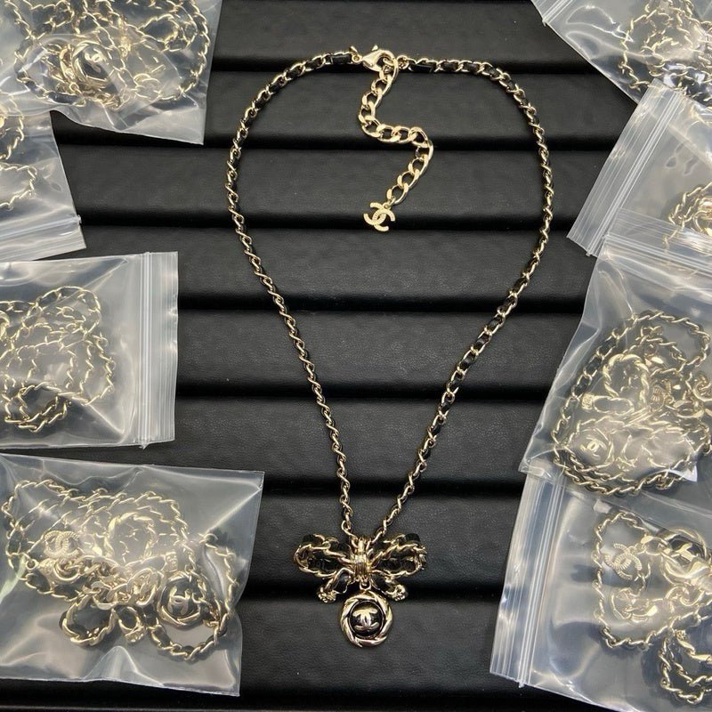 Chanel Bow Camellia Crystal Pendant Necklace