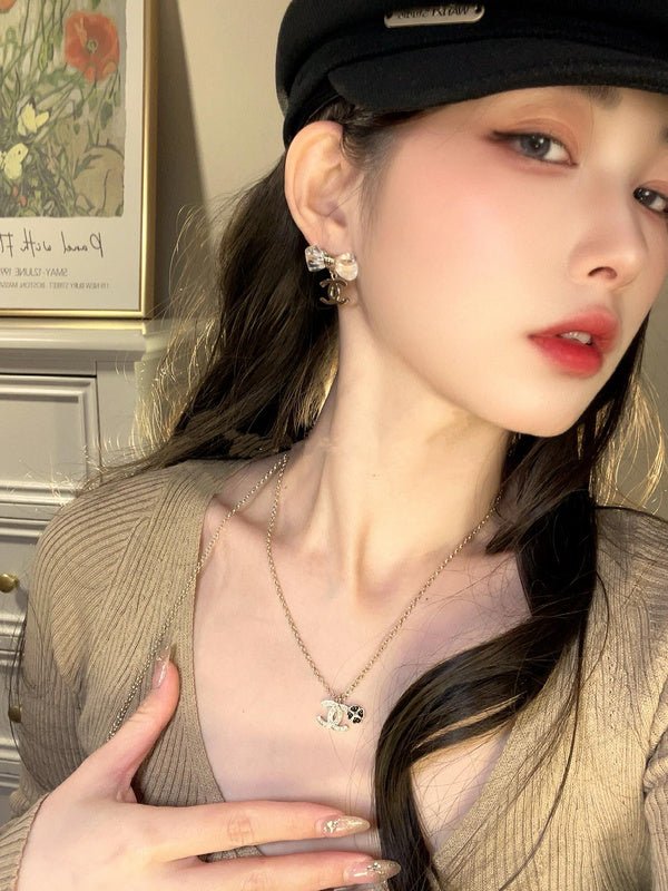 Chanel Resin Bow Silver Logo Earrings - Image 4