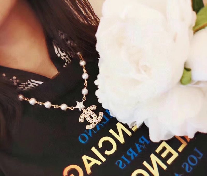 Chanel Gold Pearl Star CC Logo Necklace - Image 7
