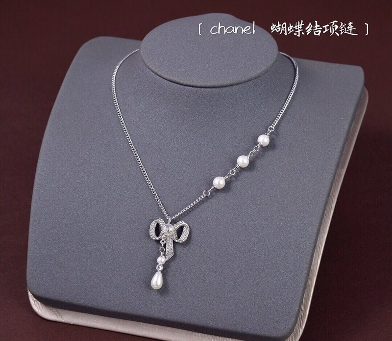 Chanel Silver Crystal Bow Pearl Necklace