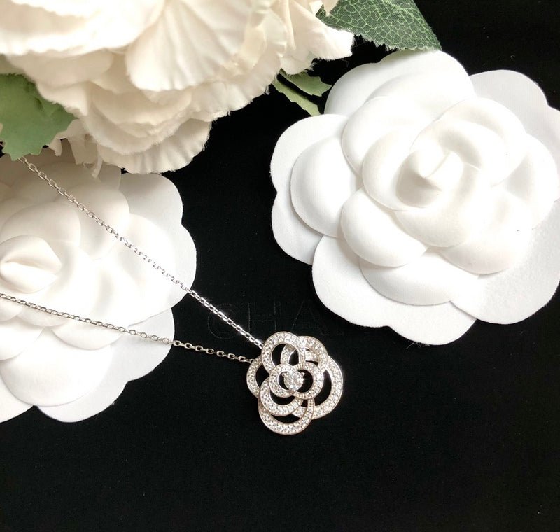 Chanel Silver Crystal Hollow Camellia Pendant Necklace