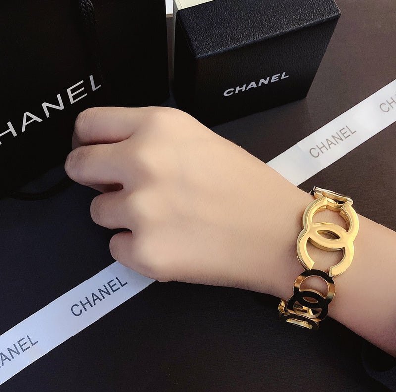 CHANEL Large Hollow Double CC Gold Cuff Bracelet