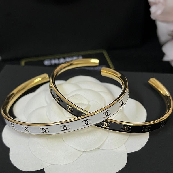 Chanel Two-Tone Star Inlay Cuff Pair