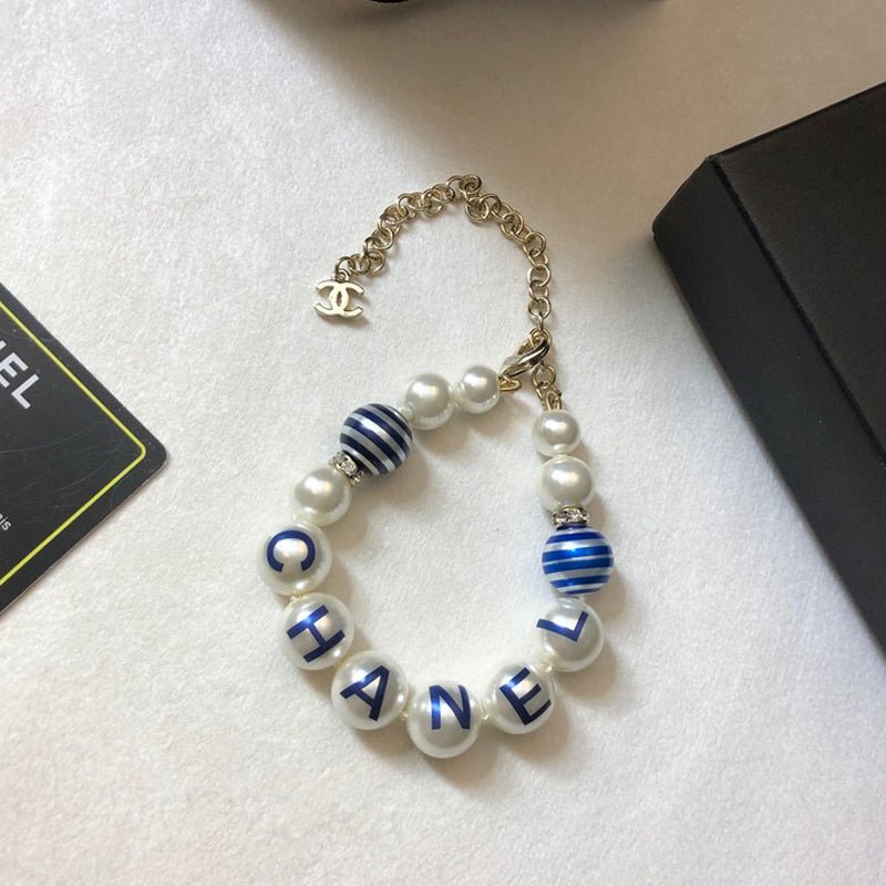 Chanel Printed Pearl Stripe Bead Bracelet