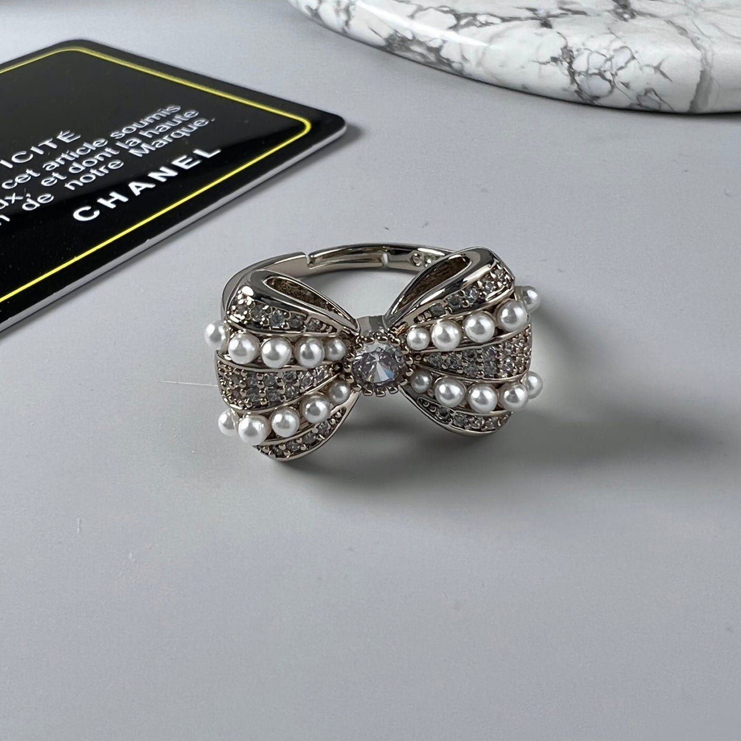 Chanel Silver Pearl Crystal Bow Statement Ring