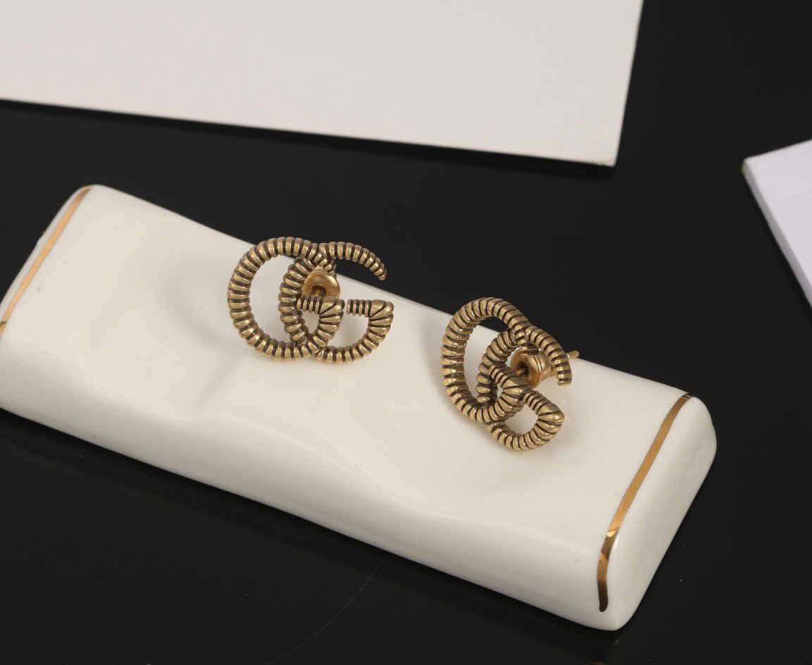 GUCCI Twisted Metal GG Stud Earrings - Image 7