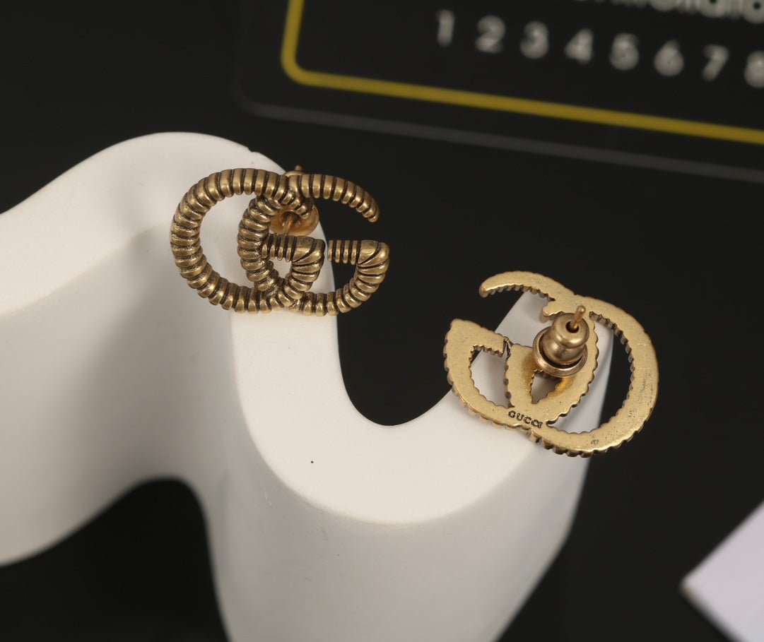 GUCCI Twisted Metal GG Stud Earrings - Image 5