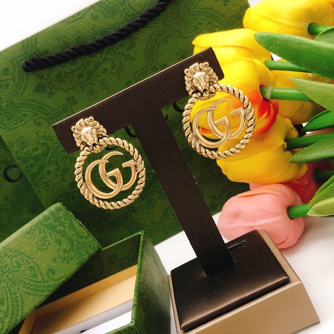 GUCCI Lion Head Twist GG Drop Earrings - Image 6