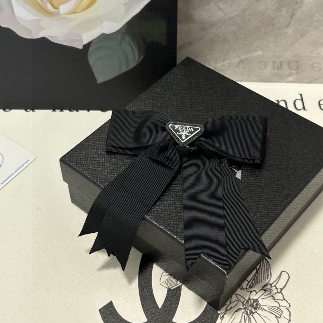 PRADA Pointed Streamer Satin Bow Clip - Image 3