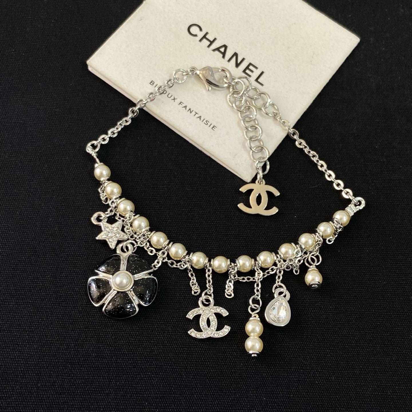 Chanel Silver Multi-Charm Pearl Tassel Bracelet