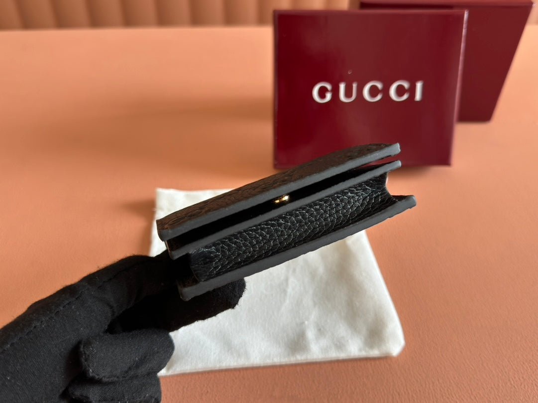 GUCCI Black GG Embossed Bifold Wallet - Image 4